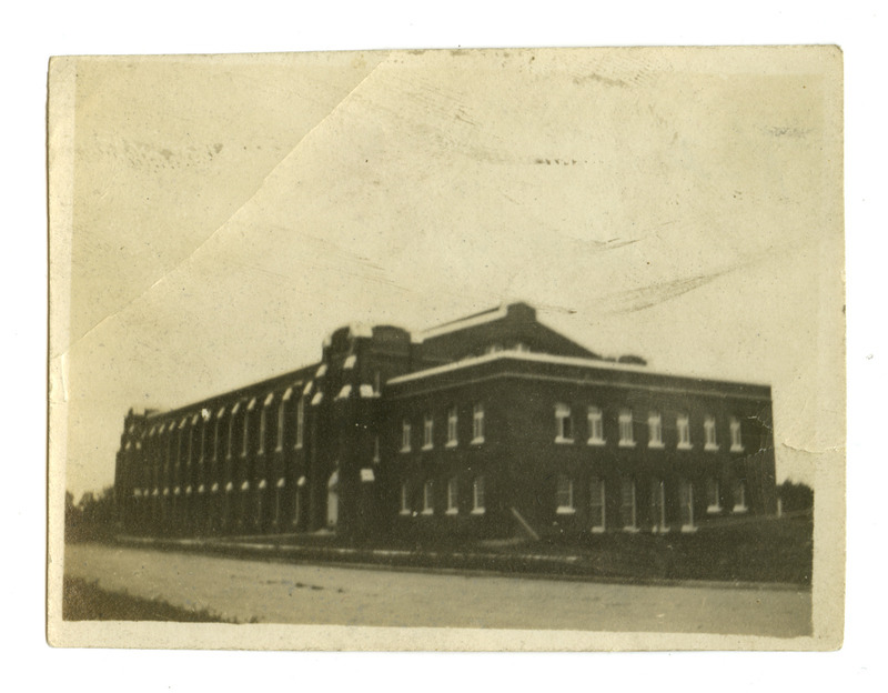 The State Gymnasium is shown soon after completion, viewed from the northwest, in this lighter exposure. Plantings near the road are very small.