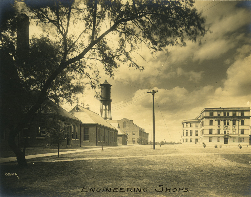 The Marston Water Tower is on the left behind the engineering shops and Engineering Hall II (later known as Marston Hall) is on the right, circa 1903.