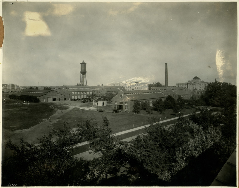 Central Building (later known as Beardshear Hall) is in the right background and Engineering Hall II (later known as Marston Hall) is in the central background. From left to right is the Armory, Exhibit Hall, Machine Shop and Steam and Gas Laboratory (later known as Mechanical Engineering Laboratory); and C E Laboratory (Old Engineering Hall), 1925.