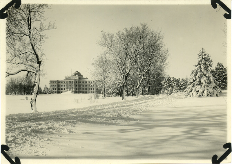 Iowa State University in the winter, circa 1920. Beardshear Hall can be seen toward the left.