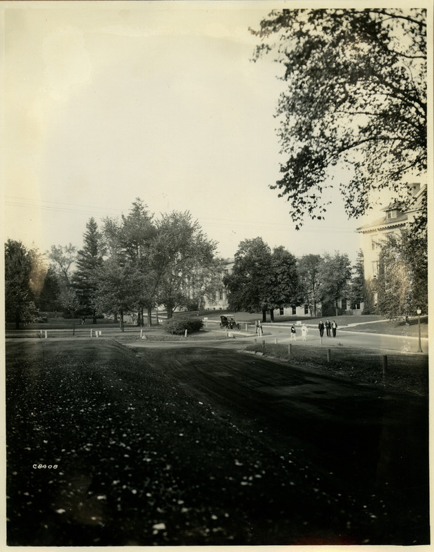 Iowa State University campus in 1929. Several people can be seen walking in the distance.