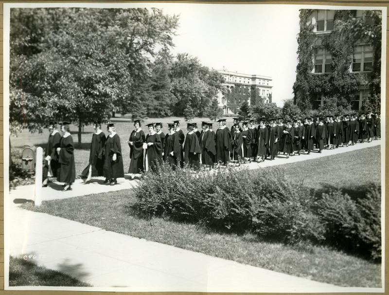 Commencement procession held on June 15, 1936. Marston Hall is in the background.