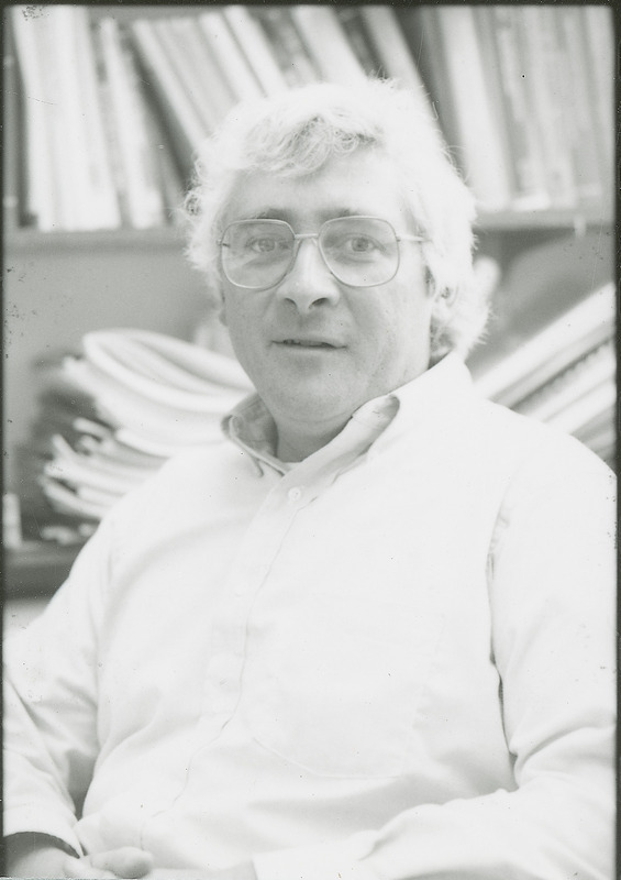 Paul Gallagher, Associate Professor of Economics and associate of the Center for Agricultural and Rural Development, is shown in his office in 568D Heady Hall, 1989.