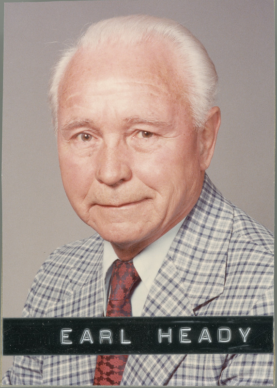 Earl O. Heady is shown in a color portrait taken in the 1970s.