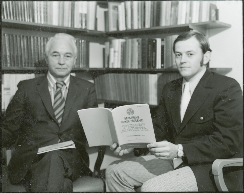 Earl Heady, Director of the Center for Agricultural and Rural Development, and Howard Madsen, Staff Economist and Director of Environmental Research for CARD, look at CARD Report 39, Bargaining Power Programs, that they authored together, 1972.