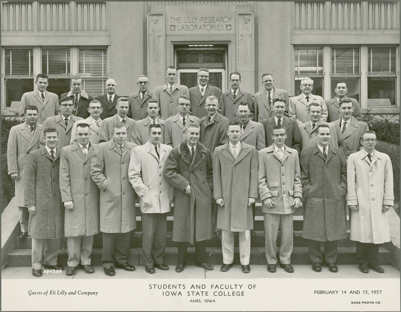 Students and faculty are standing on the steps in front of the Lilly Research Laboratories during a visit on February 14 and 15, 1957.