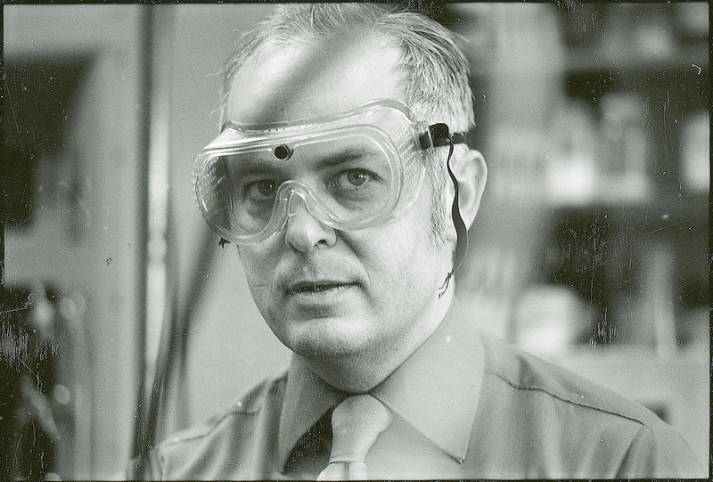 Professor Abraham is wearing a pair of safety goggles in this 1973 informal portrait.