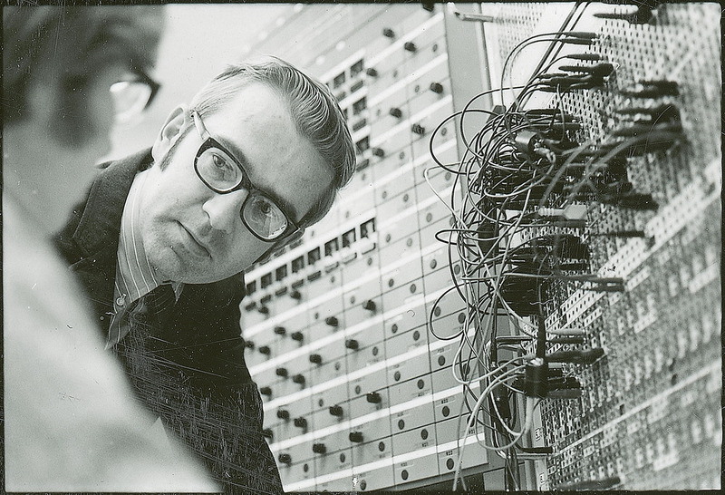 Two researchers are adjusting a control panel. This is a close-up view of 11-04-F.ChemEng.838-01-08-24a.