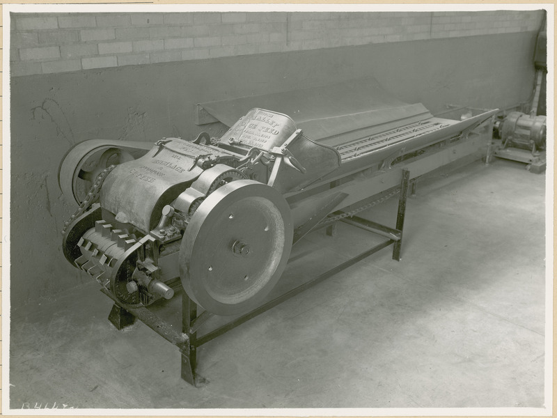 This is the Smalley Force Feed Ensilage and Fodder Cutter. Patent dates of Jan. 26, 1904, Aug. 9, 1910, and Nov. 12, 1912 are engraved on the top of the machine. Machine is part of project 158.