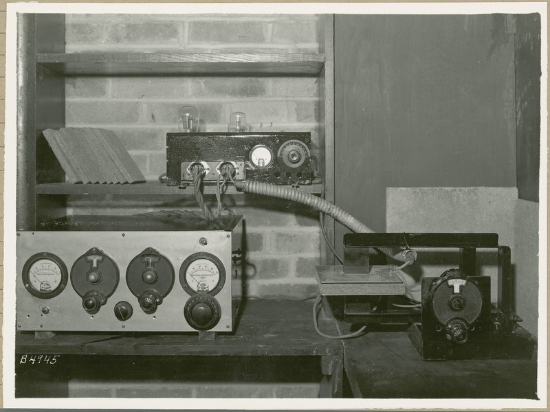 The two pieces of equipment on the left measure milliamperes and microamperes and are connected to another piece of equipment on the right.