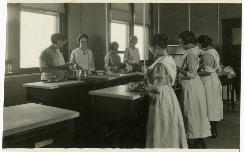 A group of women are preparing food.