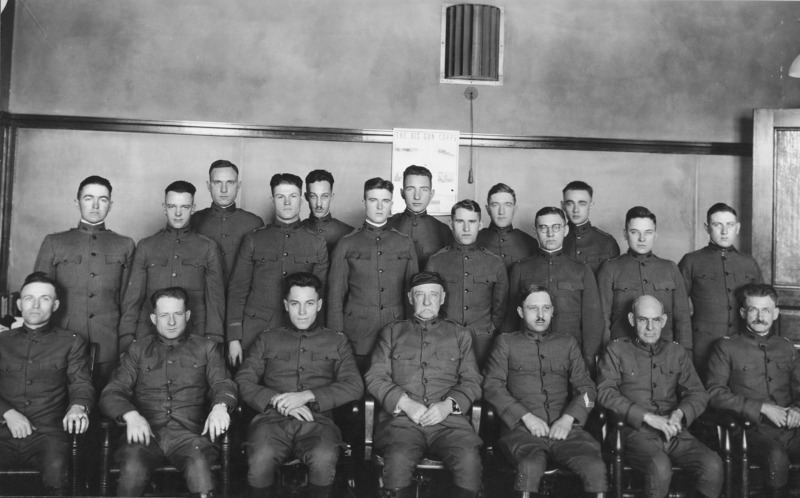 General Lincoln and the staff of the Student Army Training Corp. Taken on January 1, 1919, the photograph shows twenty uniformed men in three rows with the front row sitting in chairs, at the middle of which sits General Lincoln.