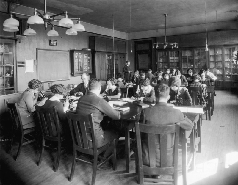 Students are working in the Botany Lab in Central Building (Beardshear Hall). The instructor is standing in the back of the room.