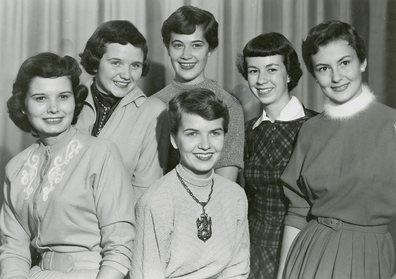 Homecoming Queen, Pat Nelson (center) is seated in front of finalists left to right: Charlotte Strothman (New London);Mary Graham (Webster City);Sally Brun (Waterloo); Nancy Stahlman (Camphill, Pa.);Nancy Winslow (Ames).