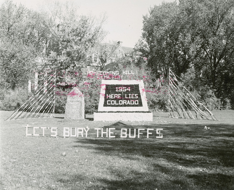 "Let's Bury the Buffs" is the theme of the Alumni Hall's display, a second place winner in the men's residences category. At the center of Homecoming Hill Cemetery is a grave marker that reads, "1954 Here lies Colorado." The grave stone to the left reads, "1953 Missouri passes on 13-7.".