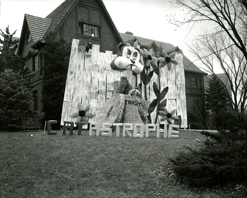 "Catastrophe", Gamma Phi Beta, Omega Chapter's lawn display, won first place in the Sorority Division. The display features Cy sitting on a fence looking down at a saddened Kansas State Wildcat.