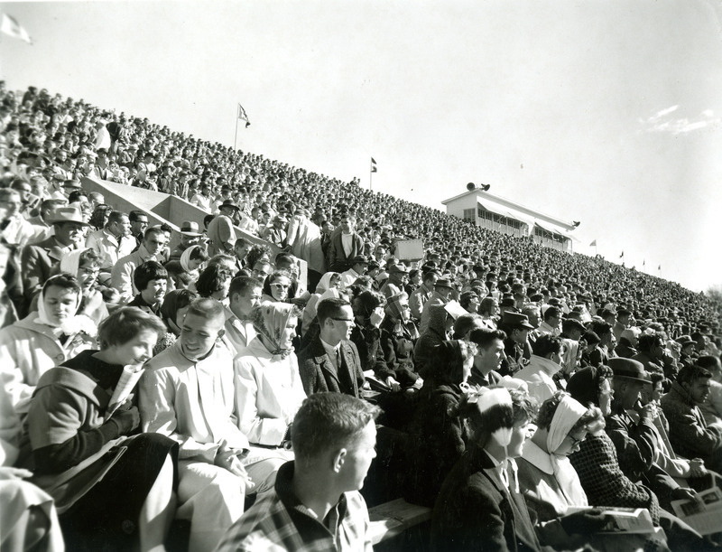 Fans are sitting in the stands at Clyde Williams Field.