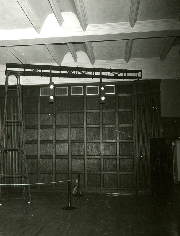 Railroad signal lights hang from an overhead beam as part of the decoration for the Homecoming Dance with the theme Night Train, 1965.