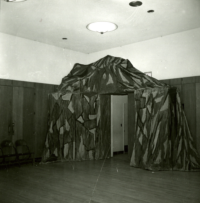 An exit is decorated like a train tunnel for the Night Train-themed Homecoming Dance, 1965.