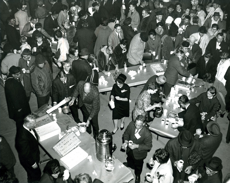 Alumni attend coffee hour at Homecoming, October 15, 1966. Red Barron, director of alumni affairs at Iowa State during 1937-1968, is in the lower left corner.