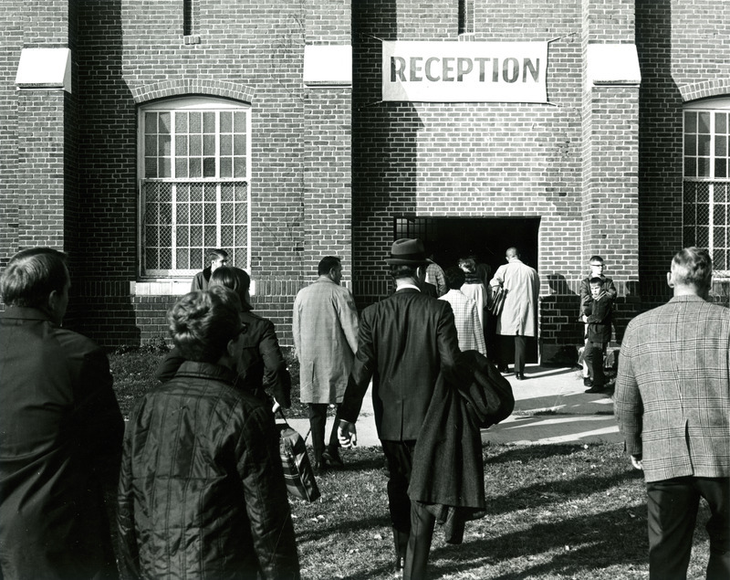 Alumni head for the Homecoming reception in the State Gym, 1968.