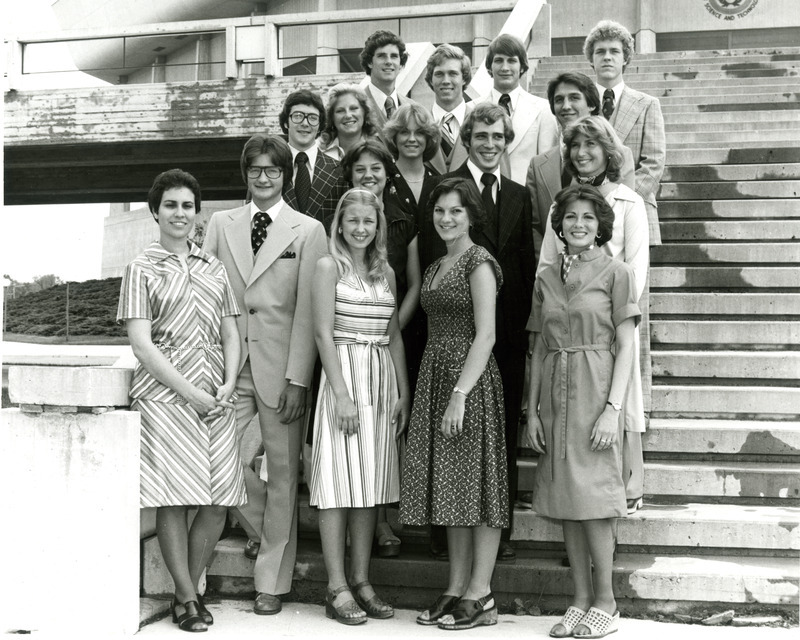 The Homecoming Central Committee poses on the steps of Hilton Coliseum, 1977. Advisor Monica Porter is in the first row on the far lower left.