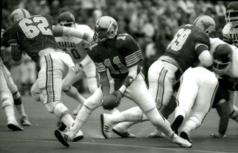 The ISU quarterback, Alex Espinoza, tosses the ball during the Homecoming Game against Kansas, 1985.