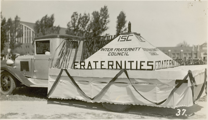 A 1937 VEISHEA parade float from the ISC Inter Fraternity Council. A replica of the Campanile tops the pyramid.