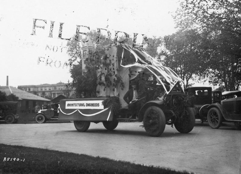 A 1923 VEISHEA float from the Department of Architectural Engineering. The float carries a replica of the Campanile with landscaping. The flatbed truck is labeled "Architectural Engineers" on the side. See photographs 1722-2-6 and 1722-2-7 for other views of the same float.