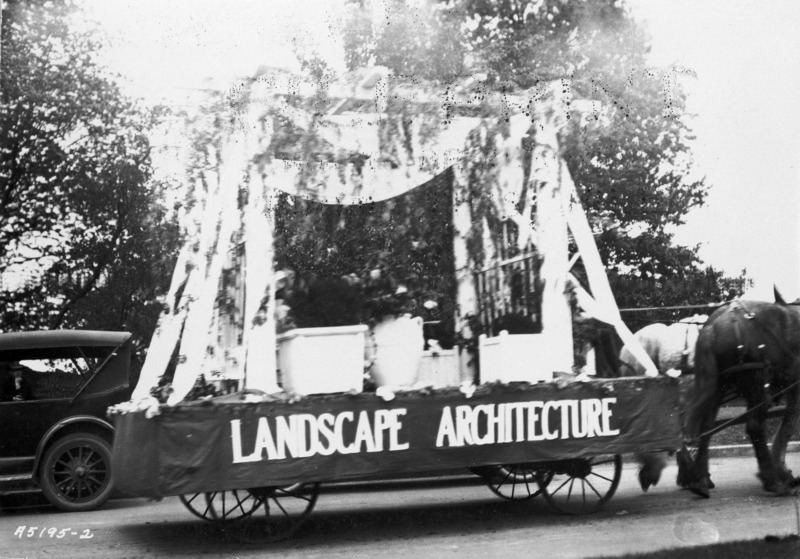 1923 motorized vehicle float. "Marathon dance record coast to coast present record Ames 1000,000 hours." Nine people stand on the flat bed, some with instruments.