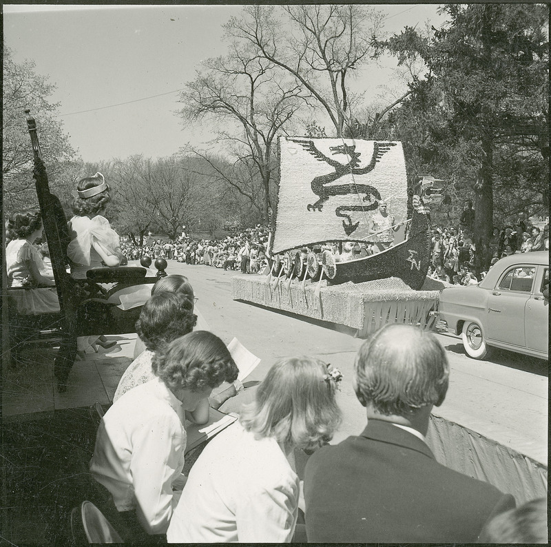 A 1950 VEISHEA parade float. Sigma Nu viking ship with its dragon mast sail and dragon head on the front and back won the sweepstakes for best float.