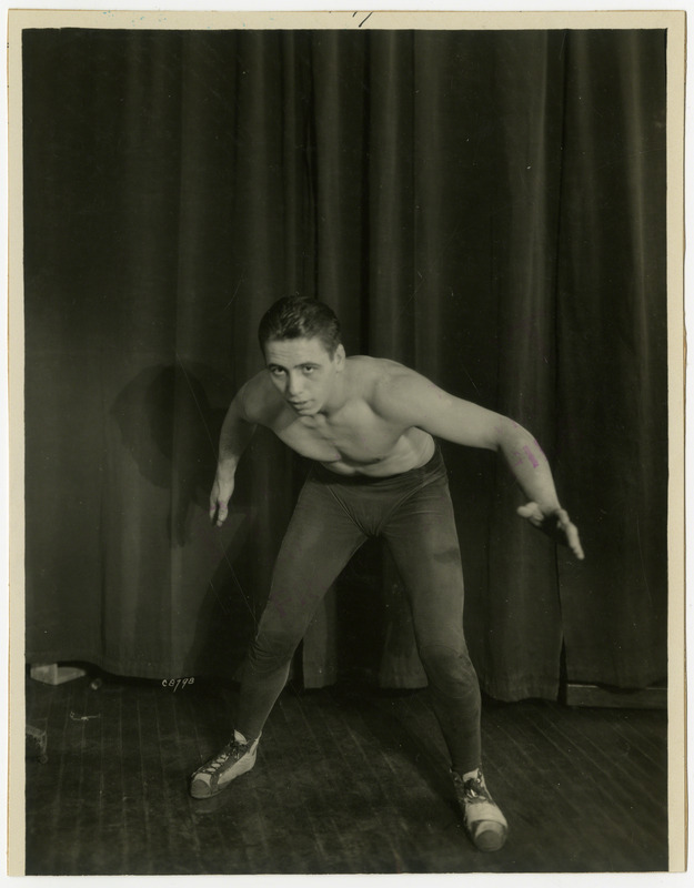 George Martin, Iowa State University wrestler, poses for a portrait, December 19, 1930. He was a two time Big Six Champion, placed third in the NCAA Tournament in 1932, and was NCAA champion at 165 pounds in 1933.