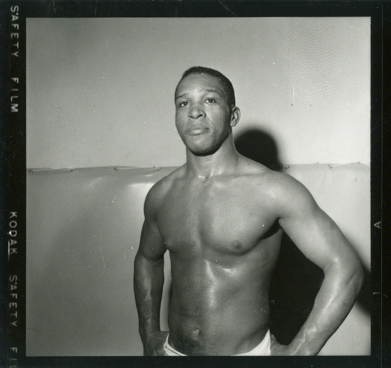 Ellie Watkins, Iowa State University wrestler, poses for a portrait, 1957.