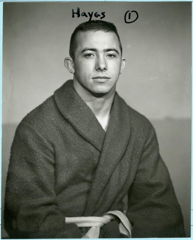 Larry Hayes, Iowa State University wrestler, poses for a portrait, 1960.