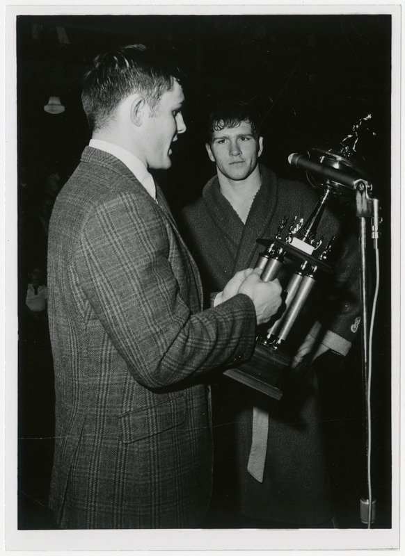 Dan Gable, Iowa State University wrestler, is awarded trophy, circa 1970.