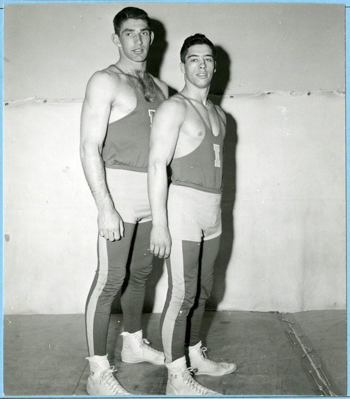 Iowa State University wrestlers (left to right), Roger Pohlman and Ron Gray, pose for portrait.