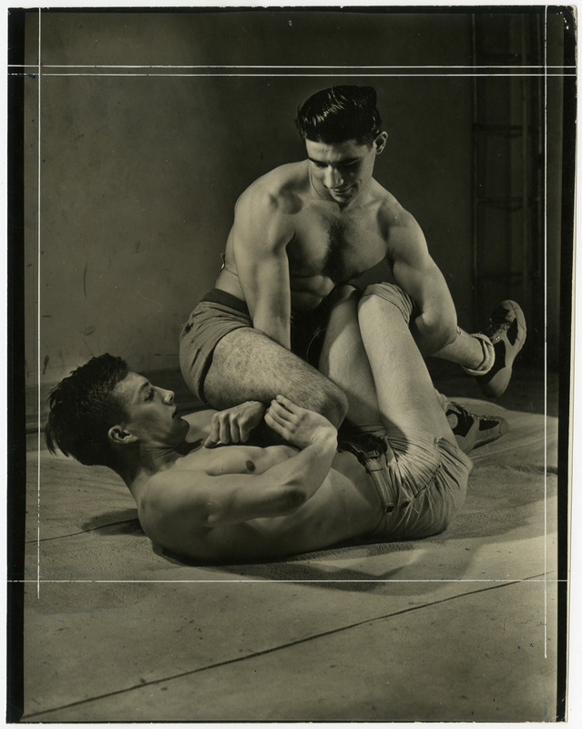 Ray Stone and Rob Cutting pose in grappling hold.