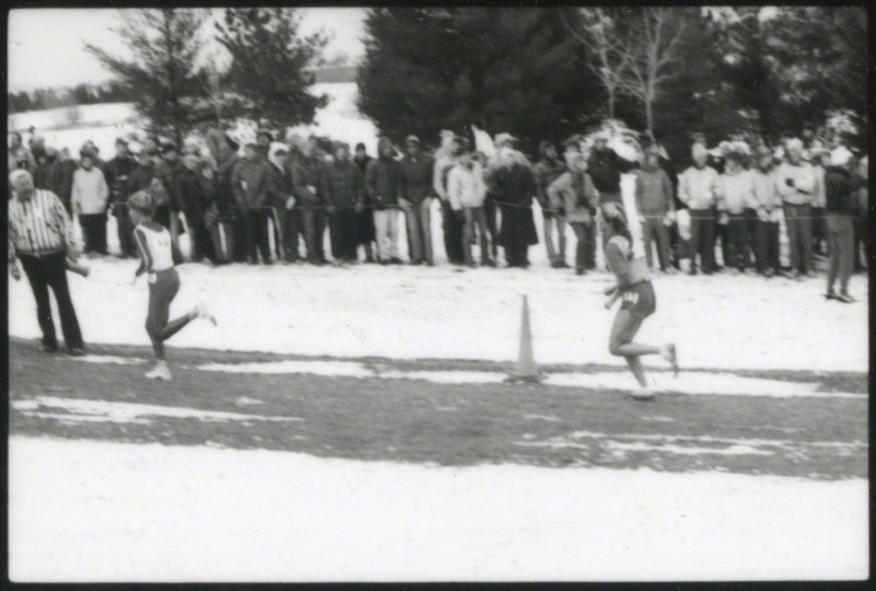 Two runners and a race official at the NCAA Women's cross-country meet Milwaukee, Wisconsin, on November 25, 1985, several hours before the plane crash.