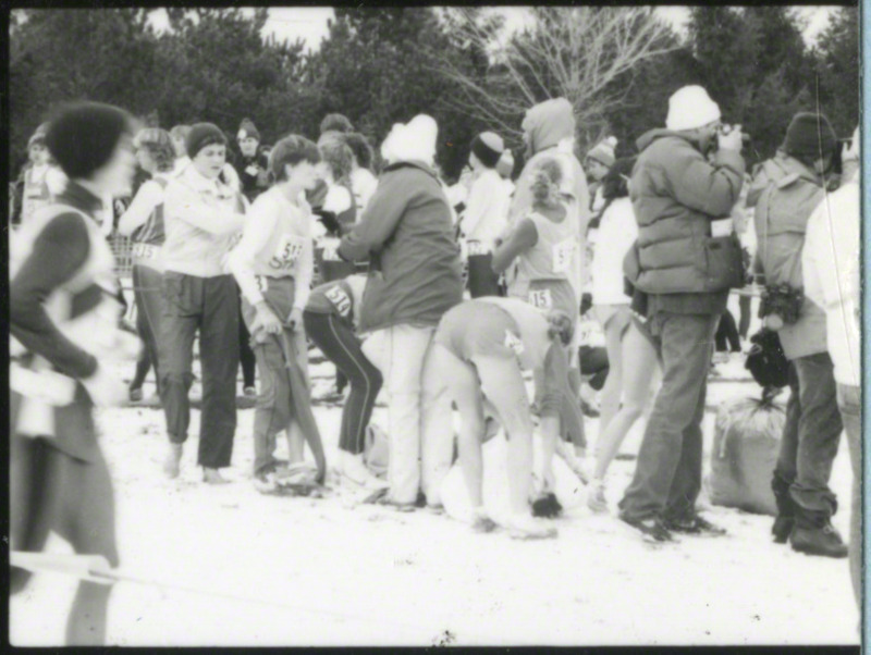 Runners gathering, either before or after the race, at the NCAA Women's cross-country meet Milwaukee, Wisconsin, on November 25, 1985, several hours before the plane crash. The main group in focus may be members of the Iowa State team.