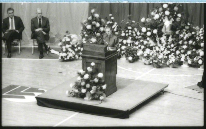 The Reverend Ann Clay Adams is speaking from the podium at the memorial service, 1985.