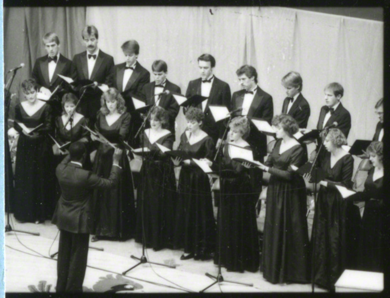 Josef Knott is conducting the Iowa State University Chamber Singers at the memorial service, 1985.