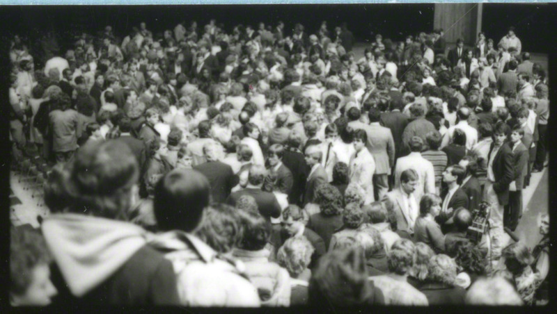 People are leaving their seats at the conclusion of the memorial service, 1985.