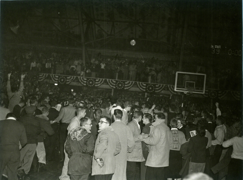 After the game, the crowd takes to the court.