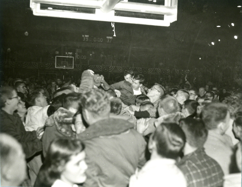 After the game, the crowd takes to the court.