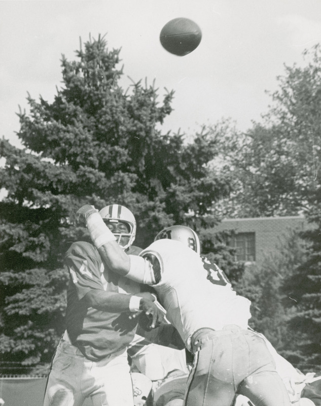 Iowa State football game against Colorado. Rick Ogle LB of Colorado tries to sack Tisdale as he gets the pass away.