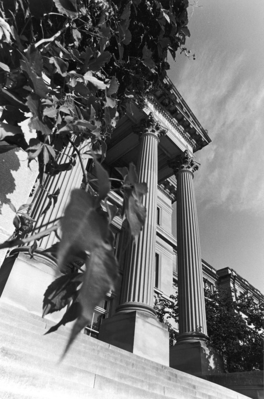 The front steps of Beardshear Hall, focusing on the columns and steps.