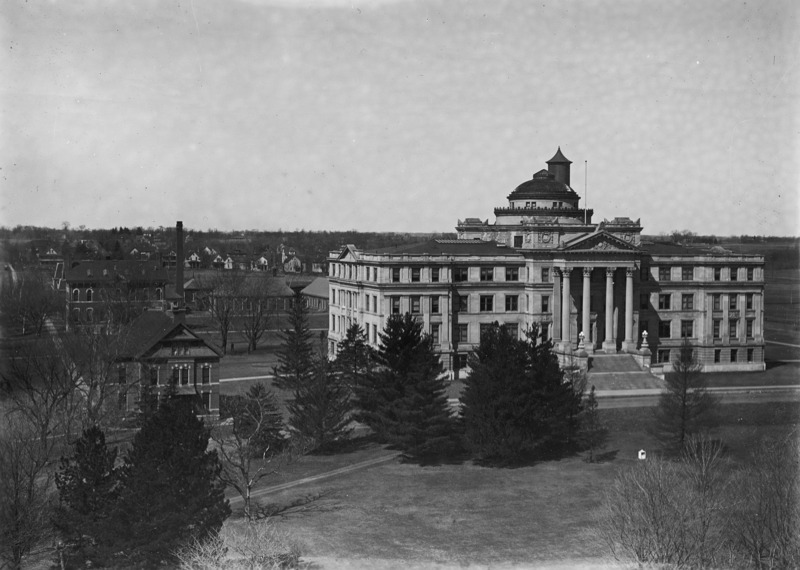 An aerial view of Beardshear Hall and the English Office Building, showing the top of the Marston Water Tower behind Beardshear Hall.