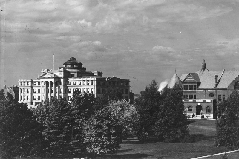 An aerial view of the fronts of Beardshear Hall and Morrill Hall with Alumni Hall in the distance.