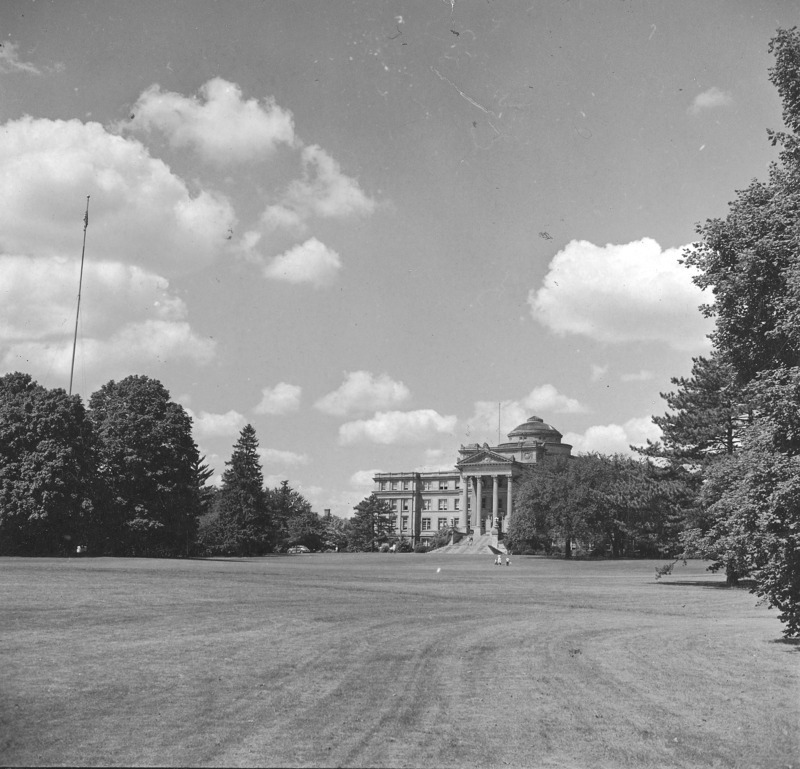 Beardshear Hall as seen from a great distance across the central campus lawn.