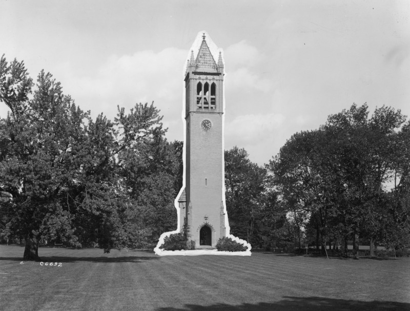 An image of the west side of the Campanile with a white border possibly for reproduction purposes with a backdrop of trees. The clock on the tower shows 4:12.